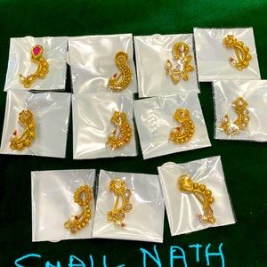 Indian traditional Gold coloured nose rings.